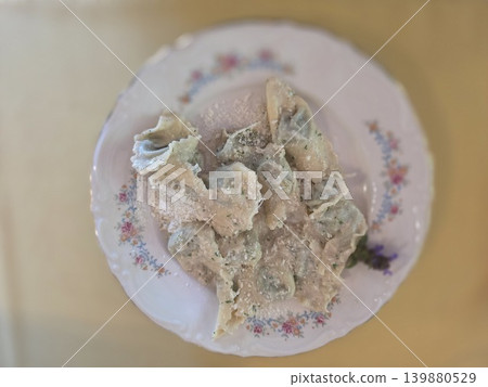Pansoti with walnut sause typical stuffed pasta of liguria italy Pansoti with walnut sause typical stuffed pasta of liguria italy 139880529