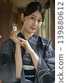 A young woman in a yukata 139880612