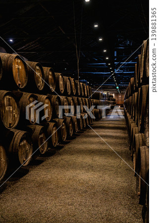 Wine cellar with wooden barrels in Porto Portugal 139881365