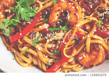 udon noodles, shrimp with vegetables and fresh herbs, in a bowl with chopsticks, light background, homemade, no people, udon noodles, shrimp with vegetables and fresh herbs, in a bowl with chopsticks, light background, homemade, no people, 139881678