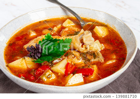 Souzi soup. Georgian dish, meat with oats, tomato sauce and herbs, Souzi soup. Georgian dish, meat with oats, tomato sauce and herbs, 139881710