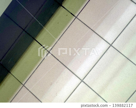 Patterns of Ceramic Tiles in a Modern Indoor Space During Daylight Hours Patterns of Ceramic Tiles in a Modern Indoor Space During Daylight Hours 139882117