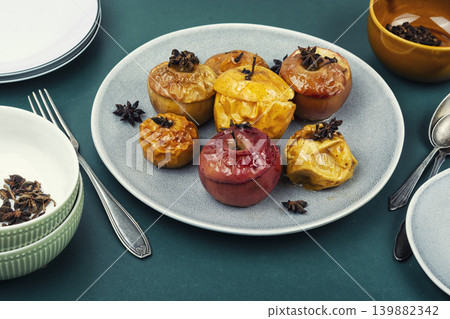 Warm Baked Apples with Cloves 139882342