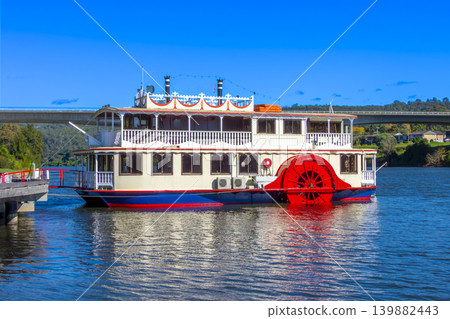 A large paddle wheeler boat docked at a wharf on the Nepean River 139882443