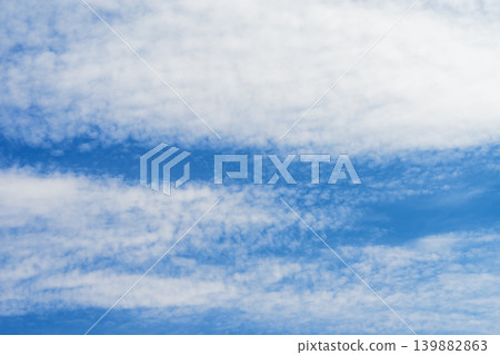 Blue sky with white clouds in sunny day. Beauty clear cloudy sky in sunshine calm air bacground Blue sky with white clouds in sunny day. Beauty clear cloudy sky in sunshine calm air bacground 139882863