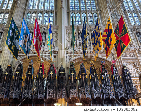 Henry VII Chapel interior With Fan Vaulting, Hanging Flags and Ornate Stained Glass Windows, Westminster Abbey, 139883062