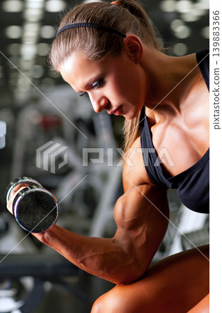 Young sports woman with dumbbell portrait Young sports woman with dumbbell portrait 139883366