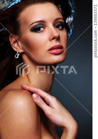 Young woman fashion portrait on dark background 139883371