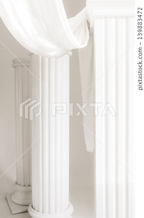 Minimalist studio composition with white classical columns, fallen pillar, white curtains Minimalist studio composition with white classical columns, fallen pillar, white curtains 139883472