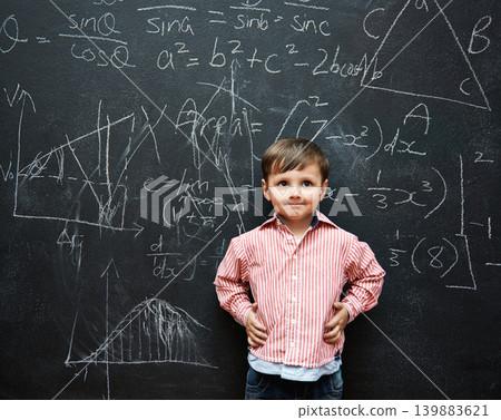 Smart, child and math on chalkboard for school, learning and education with ideas, thinking or confidence. Genius and clever kid, boy or student with equation, numbers and test for IQ or intelligence Smart, child and math on chalkboard for school, learning and education with ideas, thinking or confidence. Genius and clever kid, boy or student with equation, numbers and test for IQ or intelligence 139883621