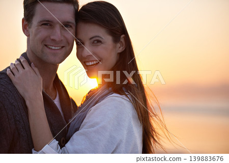 Couple hug, portrait and sunset on beach, travel for bonding and romance outdoor with love and trust. Happiness, support and loyalty with people in relationship, mockup space and adventure together 139883676