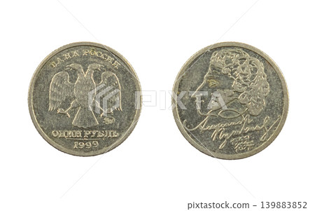 Coin from Russia shows the profile of poet Alexander Pushkin on one side. The other side displays a double-headed eagle. This coin is part of a special anniversary release from 1999. Coin from Russia shows the profile of poet Alexander Pushkin on one side. The other side displays a double-headed eagle. This coin is part of a special anniversary release from 1999. 139883852