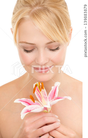 Flower, natural beauty and woman for skincare, organic cosmetics with nature and glow on white background. Tiger lily, eco friendly treatment for skin and dermatology with sustainability in studio Flower, natural beauty and woman for skincare, organic cosmetics with nature and glow on white background. Tiger lily, eco friendly treatment for skin and dermatology with sustainability in studio 139883879