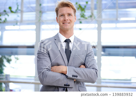 Office, portrait and businessman with arms crossed for happy in job, smile and professional worker in workplace. Accountant, positive and face with mission in corporate and formal suit for work Office, portrait and businessman with arms crossed for happy in job, smile and professional worker in workplace. Accountant, positive and face with mission in corporate and formal suit for work 139883932