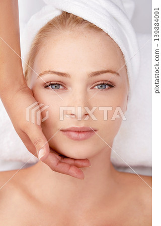Facial, massage and top view of woman with hands of masseuse, beauty and wellness with spa treatment. Skincare, face pamper cosmetics and antiaging self care with dermatology for glow in portrait Facial, massage and top view of woman with hands of masseuse, beauty and wellness with spa treatment. Skincare, face pamper cosmetics and antiaging self care with dermatology for glow in portrait 139884091