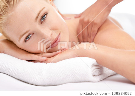 Woman, portrait and body massage at spa with hands for treatment, skincare and wellness in studio. Face of a happy client or model relax on table with therapist for shoulder, muscle or stress relief Woman, portrait and body massage at spa with hands for treatment, skincare and wellness in studio. Face of a happy client or model relax on table with therapist for shoulder, muscle or stress relief 139884092