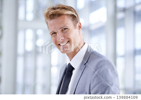 Happy businessman, portrait and lawyer at office with stylish suit for career ambition, start or job. Face of confident man employee with smile for business opportunity at corporate firm or workplace Happy businessman, portrait and lawyer at office with stylish suit for career ambition, start or job. Face of confident man employee with smile for business opportunity at corporate firm or workplace 139884109