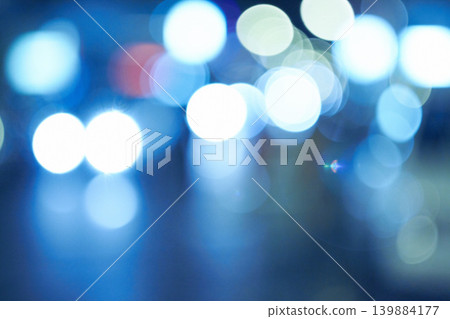 Bright lights, abstract and night with pattern, city and graphic against a blue background. Creativity, bokeh and blur with aesthetic and shining with colours and effect with circles and glowing Bright lights, abstract and night with pattern, city and graphic against a blue background. Creativity, bokeh and blur with aesthetic and shining with colours and effect with circles and glowing 139884177