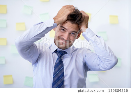 Portrait, burnout and man with business, headache and employee with anxiety, tax and pain. Face, person and worker with migraine or stress with audit or depression with accountant, mistake or startup Portrait, burnout and man with business, headache and employee with anxiety, tax and pain. Face, person and worker with migraine or stress with audit or depression with accountant, mistake or startup 139884216