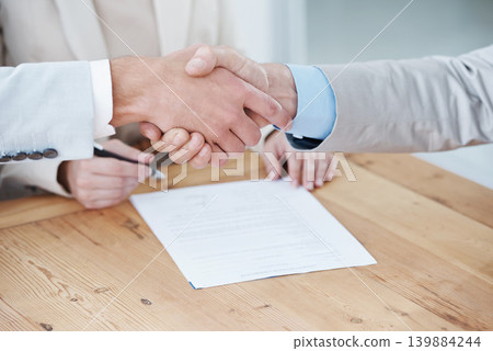 Shaking hands, business people and contract, onboarding with human resources in meeting or interview. Paperwork, cooperation and partnership with signature, recruitment and handshake for welcome Shaking hands, business people and contract, onboarding with human resources in meeting or interview. Paperwork, cooperation and partnership with signature, recruitment and handshake for welcome 139884244