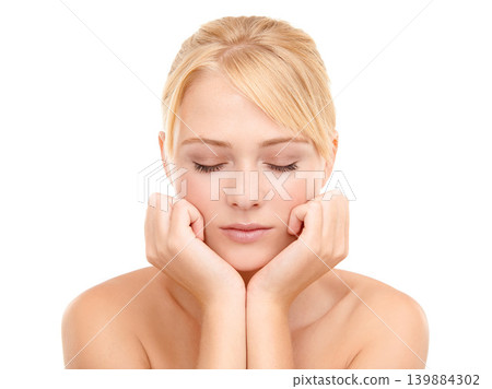 Skincare, cosmetic and woman in studio with natural, health and wellness face routine. Confident, beauty and calm young female person with facial dermatology treatment for glow by white background. 139884302