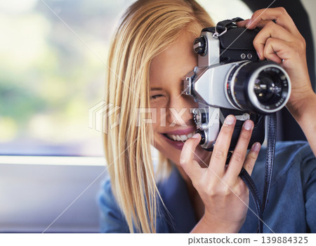 Camera, photography and woman on road trip with journey, travel and creative hobby or photoshoot. Young freelancer, traveler or photographer shooting in car for digital memory, vacation and holiday Camera, photography and woman on road trip with journey, travel and creative hobby or photoshoot. Young freelancer, traveler or photographer shooting in car for digital memory, vacation and holiday 139884325
