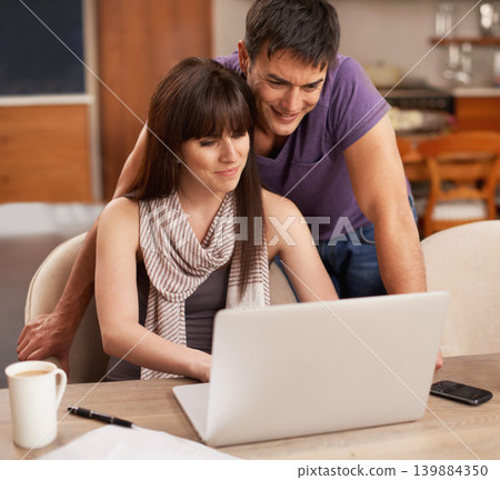 Couple, happy and laptop in kitchen with paper for budget, smile and coffee on table by pen. Partners, love and payment of apartment rent with technology, tax and online with connection from internet Couple, happy and laptop in kitchen with paper for budget, smile and coffee on table by pen. Partners, love and payment of apartment rent with technology, tax and online with connection from internet 139884350