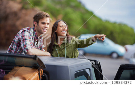 Couple, pointing at view and road trip for travel, happy with love and adventure in Australia. Direction, vacation and people in car outdoor, trust and commitment with journey and smile for tourism Couple, pointing at view and road trip for travel, happy with love and adventure in Australia. Direction, vacation and people in car outdoor, trust and commitment with journey and smile for tourism 139884372