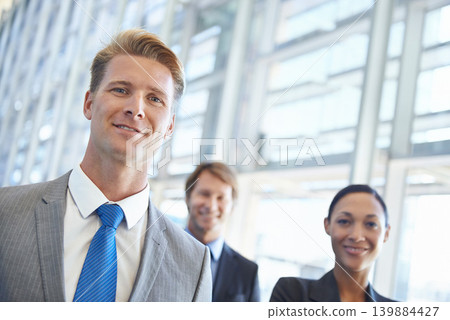 Businessman, portrait and confidence in career, office and pride in profession. Business people, teamwork and collaboration or support in workplace, smiling and entrepreneur of startup company Businessman, portrait and confidence in career, office and pride in profession. Business people, teamwork and collaboration or support in workplace, smiling and entrepreneur of startup company 139884427