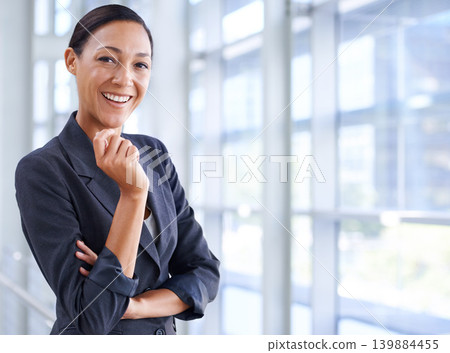 Happy woman, portrait and business professional by window of attorney at office for career ambition or law. Female person, lawyer or employee with big smile in fashion or confidence at corporate firm 139884455