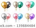Colorful balloons with ribbons float freely. 139884484