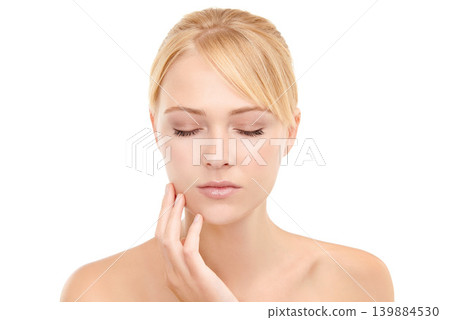 Skincare, confident and woman in studio with natural, health and wellness face routine. Cosmetic, beauty and calm young female person with facial dermatology treatment for glow by white background. Skincare, confident and woman in studio with natural, health and wellness face routine. Cosmetic, beauty and calm young female person with facial dermatology treatment for glow by white background. 139884530