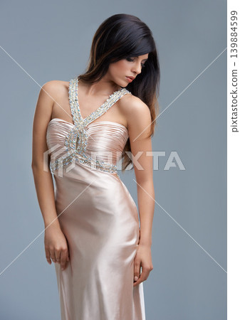 Fashion, luxury and woman with elegant dress, confidence and girl with pride in studio. Classic, glamour and vintage chic style with model on grey background for designer clothes, silk and aesthetic. Fashion, luxury and woman with elegant dress, confidence and girl with pride in studio. Classic, glamour and vintage chic style with model on grey background for designer clothes, silk and aesthetic. 139884599