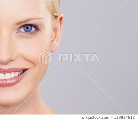 Beauty, cosmetics and half portrait of woman with smile, natural makeup or facial glow in studio mockup. Happiness, skincare and face of girl on grey background space for health shine and wellness. Beauty, cosmetics and half portrait of woman with smile, natural makeup or facial glow in studio mockup. Happiness, skincare and face of girl on grey background space for health shine and wellness. 139884618
