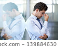Headache, stress and business man with burnout, tired or anxiety for financial crisis in office. Frustrated, depression and serious professional with fatigue, thinking or fail with regret for mistake 139884630