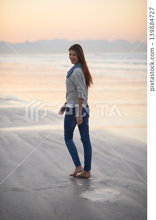 Woman, walking and happy in portrait at beach, sunset and vacation with nature to relax by ocean. Girl, person and outdoor by sea with feet in sand for holiday, adventure or smile by sea in Australia Woman, walking and happy in portrait at beach, sunset and vacation with nature to relax by ocean. Girl, person and outdoor by sea with feet in sand for holiday, adventure or smile by sea in Australia 139884727