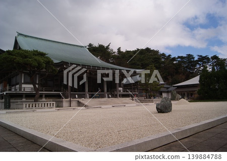 A landscape featuring a temple and a dry landscape garden. A landscape featuring a temple and a dry landscape garden. 139884788