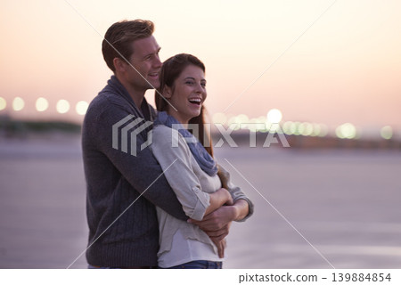 Love, embrace and couple on beach at sunset with happiness together on holiday in Florida. Travel, vacation and man hug woman outdoor on date in summer with care, support and kindness in marriage Love, embrace and couple on beach at sunset with happiness together on holiday in Florida. Travel, vacation and man hug woman outdoor on date in summer with care, support and kindness in marriage 139884854