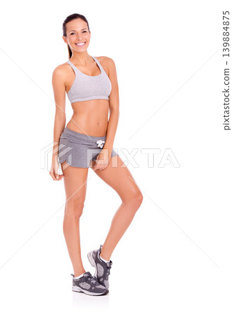 Fitness, health and portrait of woman in studio for weight loss, nutrition or wellness diet for energy. Smile, sport and slim female person for body exercise, workout or training by white background 139884875