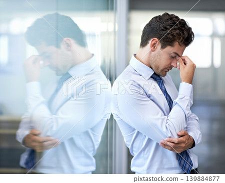 Headache, tired and business man with stress, burnout and anxiety for financial crisis in office. Frustrated, depression and serious professional with fatigue, sick and fail challenge with mistake Headache, tired and business man with stress, burnout and anxiety for financial crisis in office. Frustrated, depression and serious professional with fatigue, sick and fail challenge with mistake 139884877