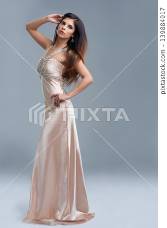 Fashion, luxury and portrait of woman with glamour, confidence and space in studio. Classic, chic and elegant style with model on grey background for designer clothes, silk and aesthetic mockup. Fashion, luxury and portrait of woman with glamour, confidence and space in studio. Classic, chic and elegant style with model on grey background for designer clothes, silk and aesthetic mockup. 139884917