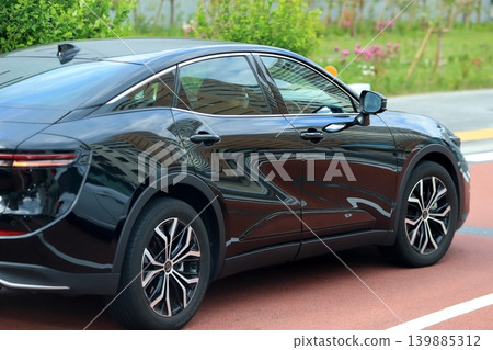 Black domestic sedan Black domestic sedan 139885312
