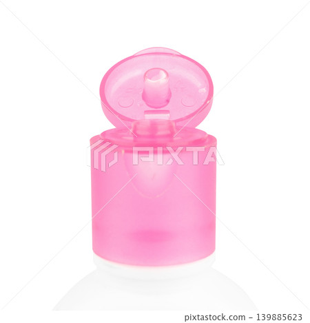 lotion bottle isolated open lid closeup color pink isolated on white background lotion bottle isolated open lid closeup color pink isolated on white background 139885623