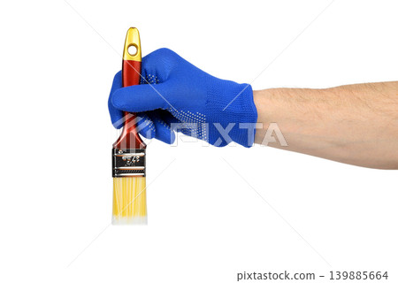hand in a blue glove holding a paint brush down isolated on white background 139885664