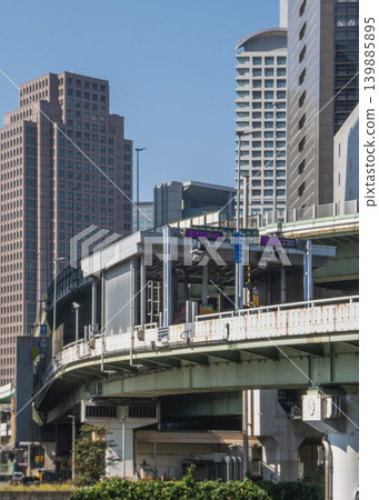 ETC toll booths on expressways running through urban areas and clusters of skyscrapers. ETC toll booths on expressways running through urban areas and clusters of skyscrapers. 139885895