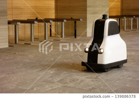Inside a building where robots are patrolling. Inside a building where robots are patrolling. 139886378