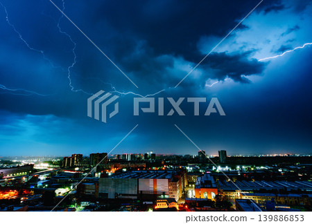 Lighting at night over the city Lighting at night over the city 139886853