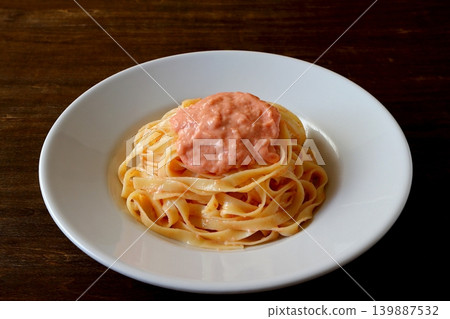 Tagliatelle with cod roe cream pasta (table background) Tagliatelle with cod roe cream pasta (table background) 139887532