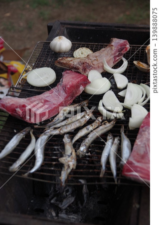 Grilled seafood over charcoal on a barbecue grill 1 Grilled seafood over charcoal on a barbecue grill 1 139888075