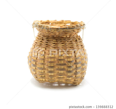 Bamboo basket hand made Handmade used for catching fish. isolated on white background. Bamboo basket hand made Handmade used for catching fish. isolated on white background. 139888312